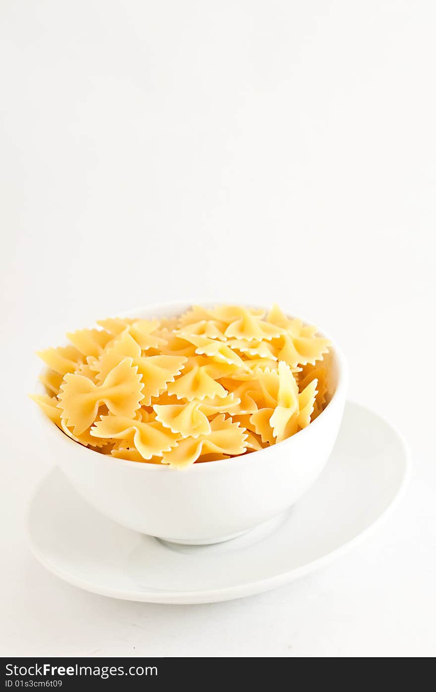 A bowl of farfalle uncooked