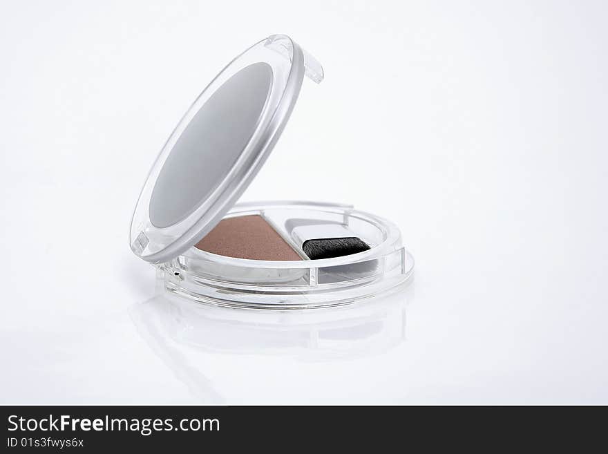 Blusher compact with brush