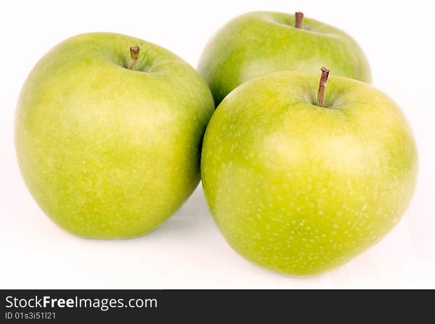 Three  green apples isolated on white background. Three  green apples isolated on white background