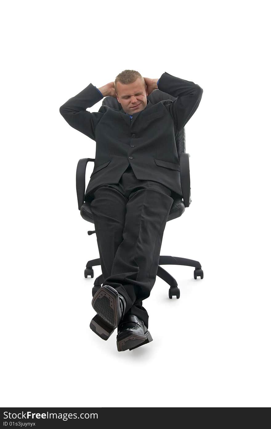 Sitting thoughtful  dealer in hands behind head.On white background. Sitting thoughtful  dealer in hands behind head.On white background.