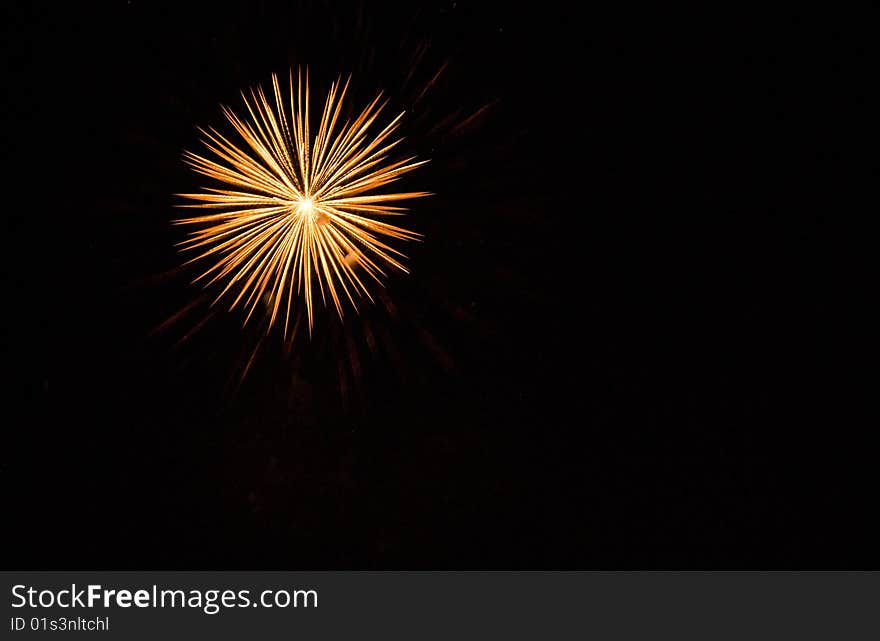 Firework against a night black sky background. Firework against a night black sky background