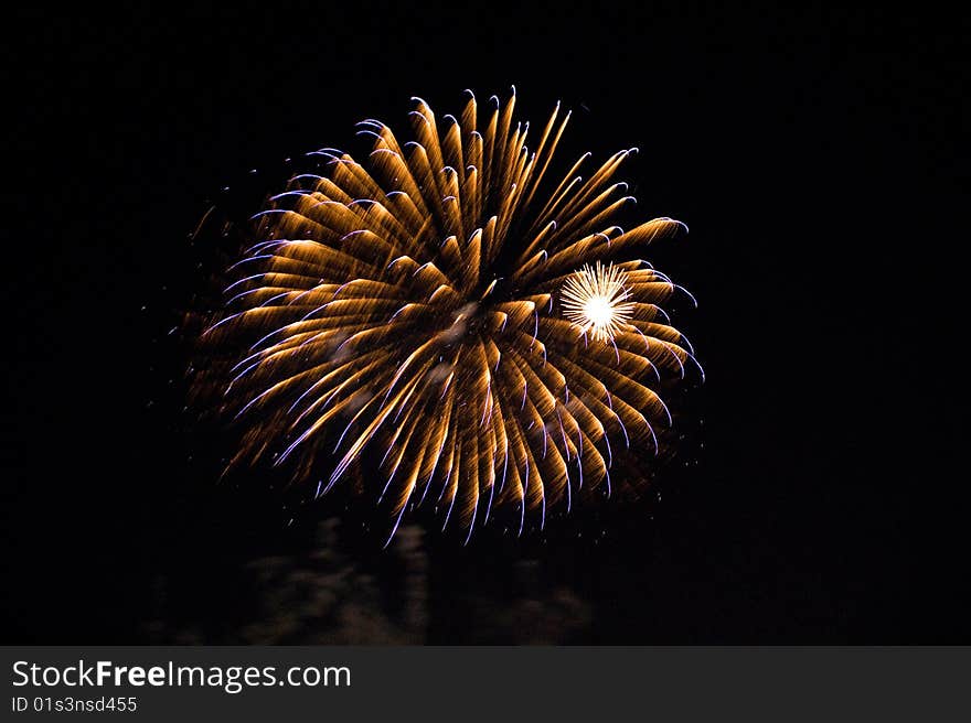 Firework against a night black sky background. Firework against a night black sky background