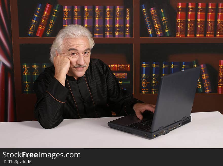 Man in black with laptop