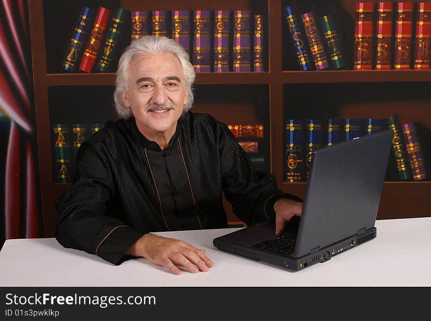 Man in black with laptop