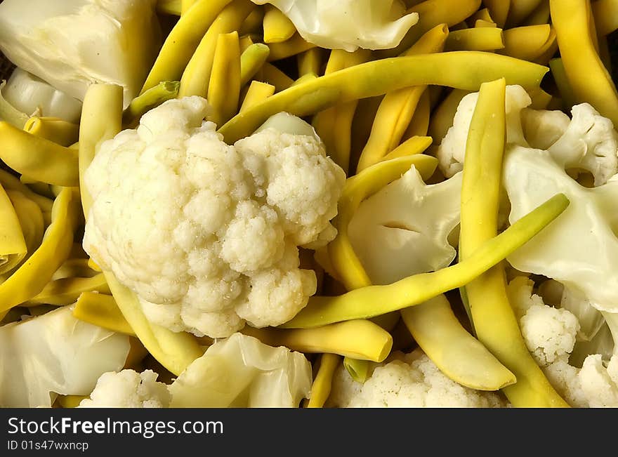 Boiled cauliflower and yellow string bean background. Boiled cauliflower and yellow string bean background