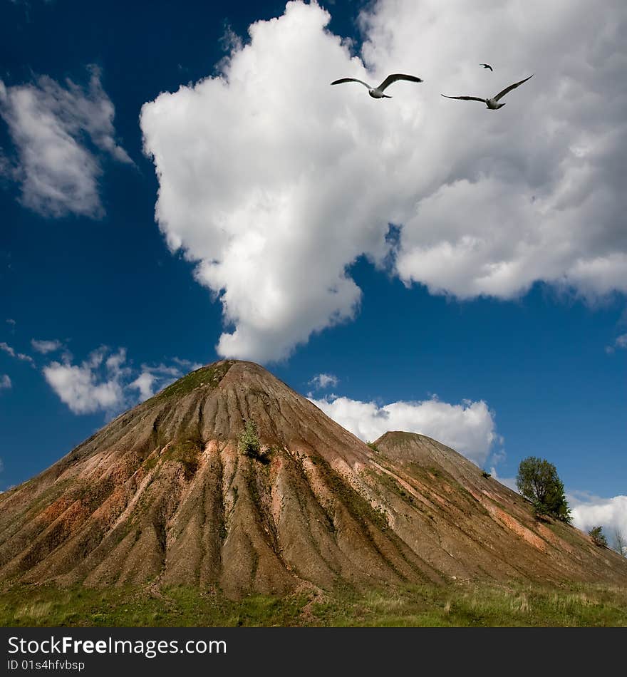 Clouds over a colliery waste heap in Ukraine. Clouds over a colliery waste heap in Ukraine