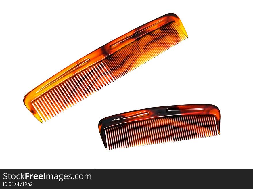 Two beautiful hairbrushes on a white background