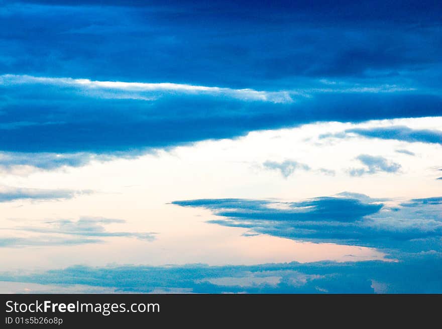 Cloudy summer sky at sunset (blue tone). Cloudy summer sky at sunset (blue tone)