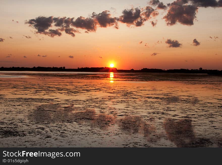 Prairie sunset on Pond