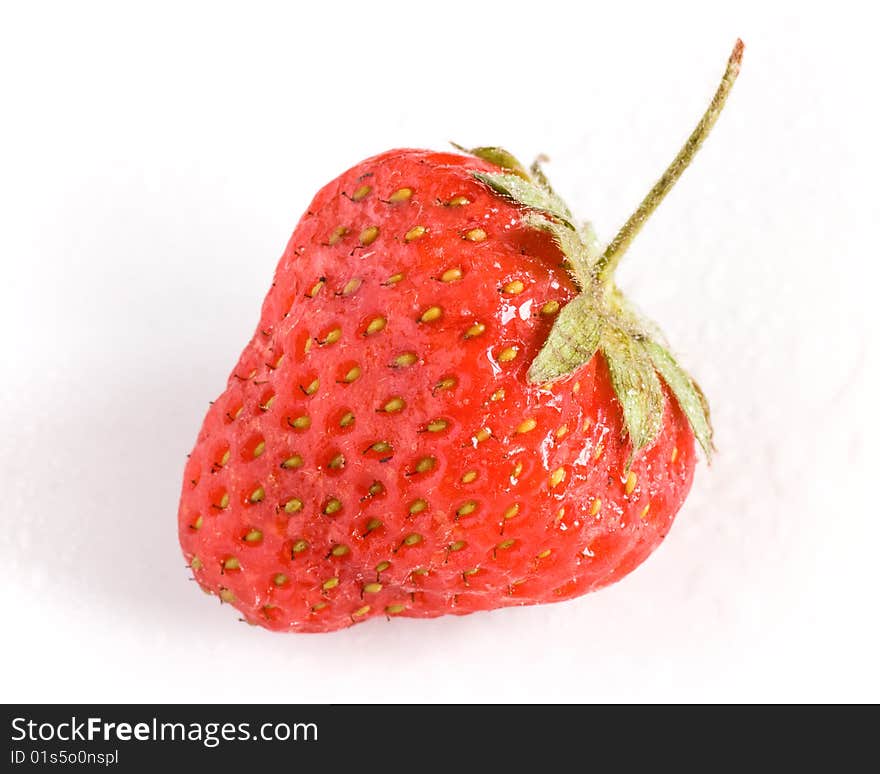 Fresh Strawberry. Shallow depth of field, selective focus. Macro shot. Extreme closeup.