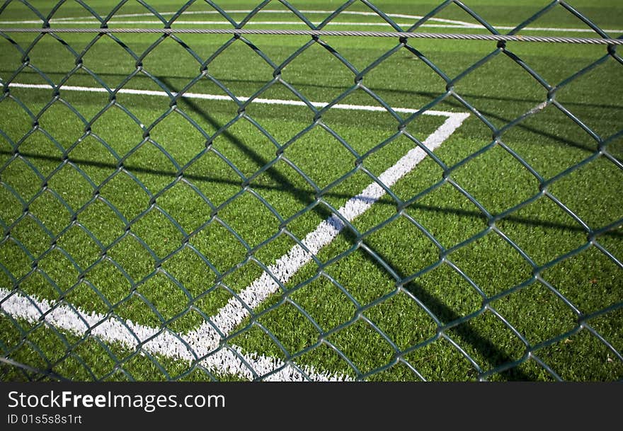 Two soccer balls in a goal. Two soccer balls in a goal