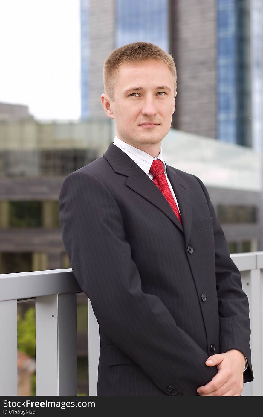 Portrait of a young businessman, outdoor the office