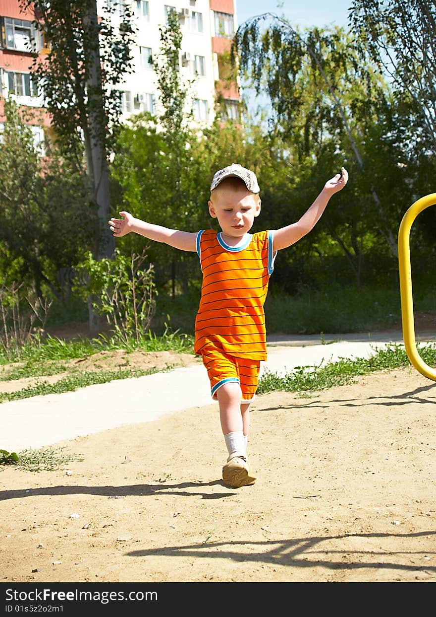 The boy on walk in the spring. The boy on walk in the spring