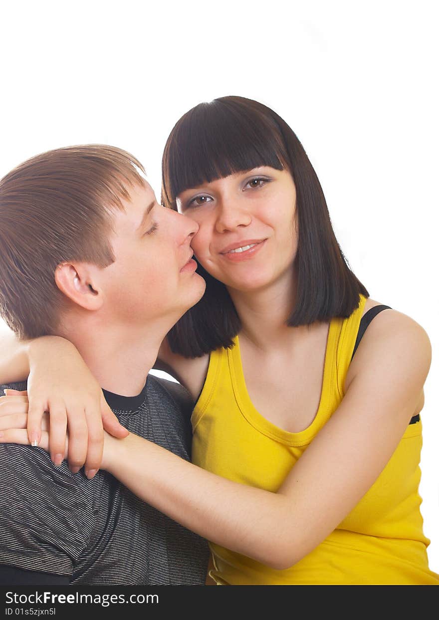 Portrait of young happy pair on a white background. Portrait of young happy pair on a white background