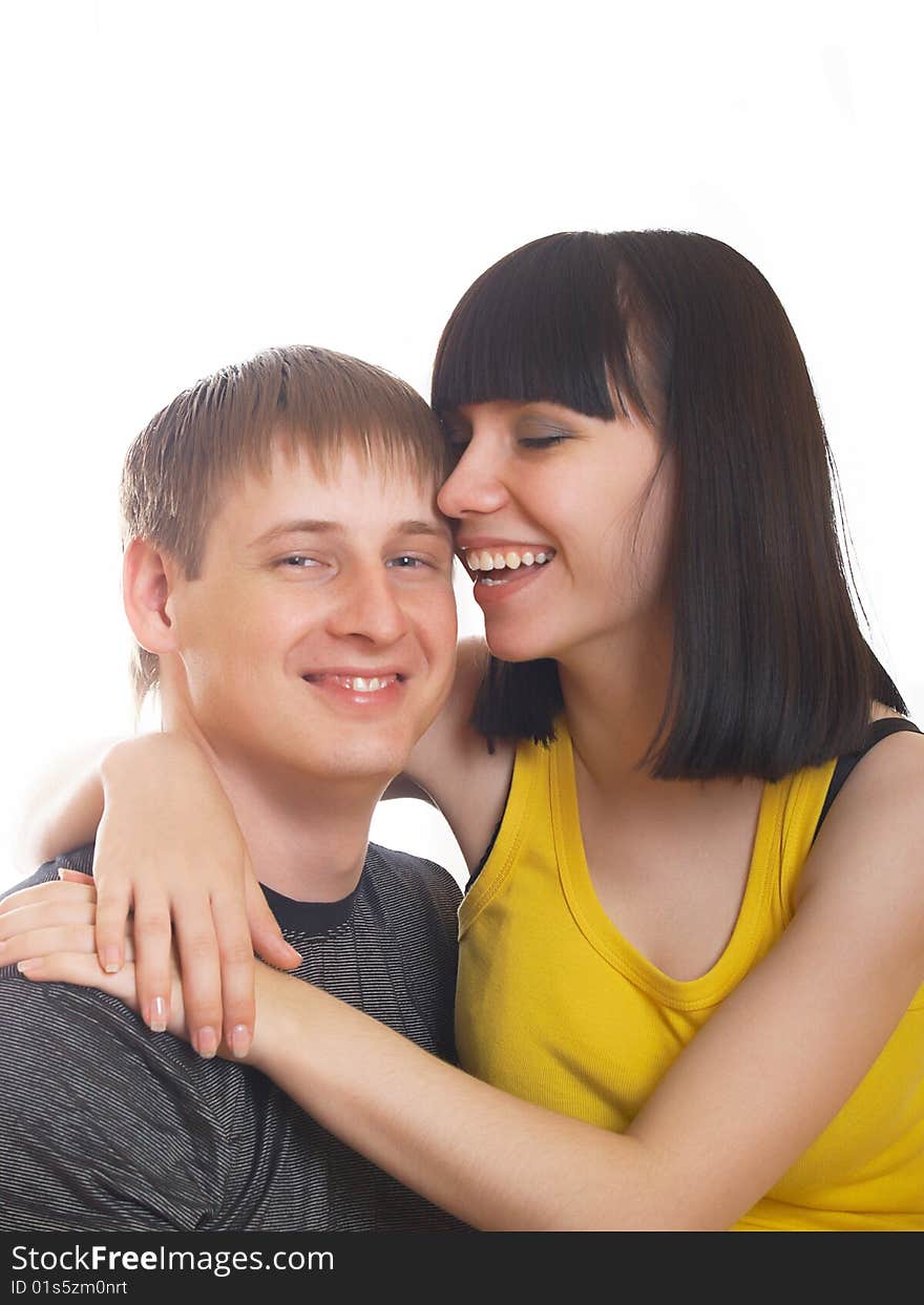 Portrait of young happy pair on a white background. Portrait of young happy pair on a white background