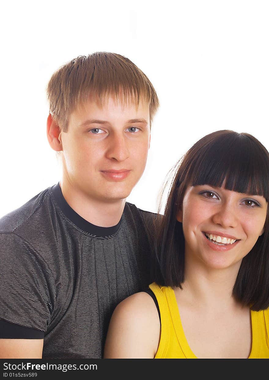 Portrait of young happy pair on a white background. Portrait of young happy pair on a white background