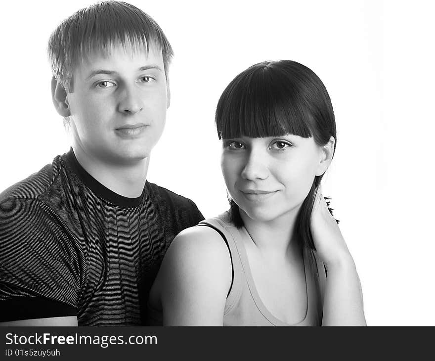 Portrait of young happy pair on a white background. Portrait of young happy pair on a white background