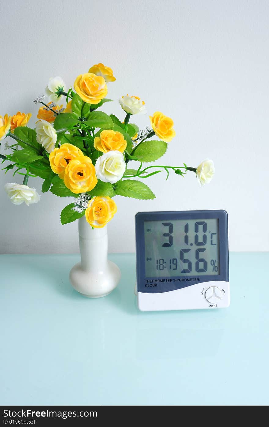 Digital thermometer with the hygroscope and clock.