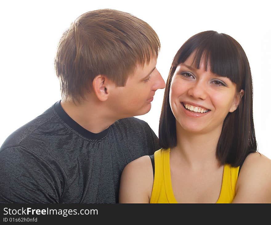 Portrait of young happy pair on a white background. Portrait of young happy pair on a white background