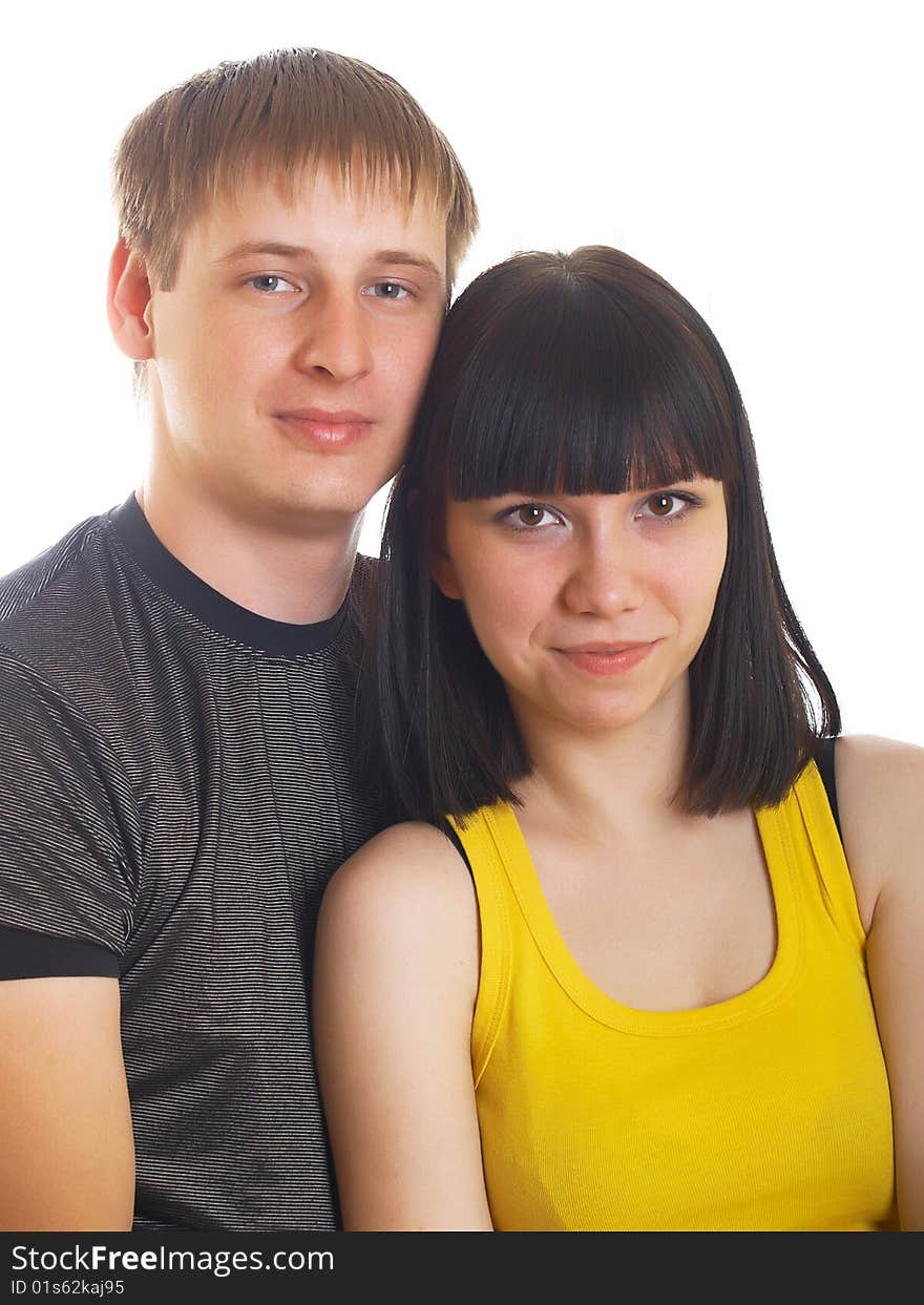 Portrait of young happy pair on a white background. Portrait of young happy pair on a white background