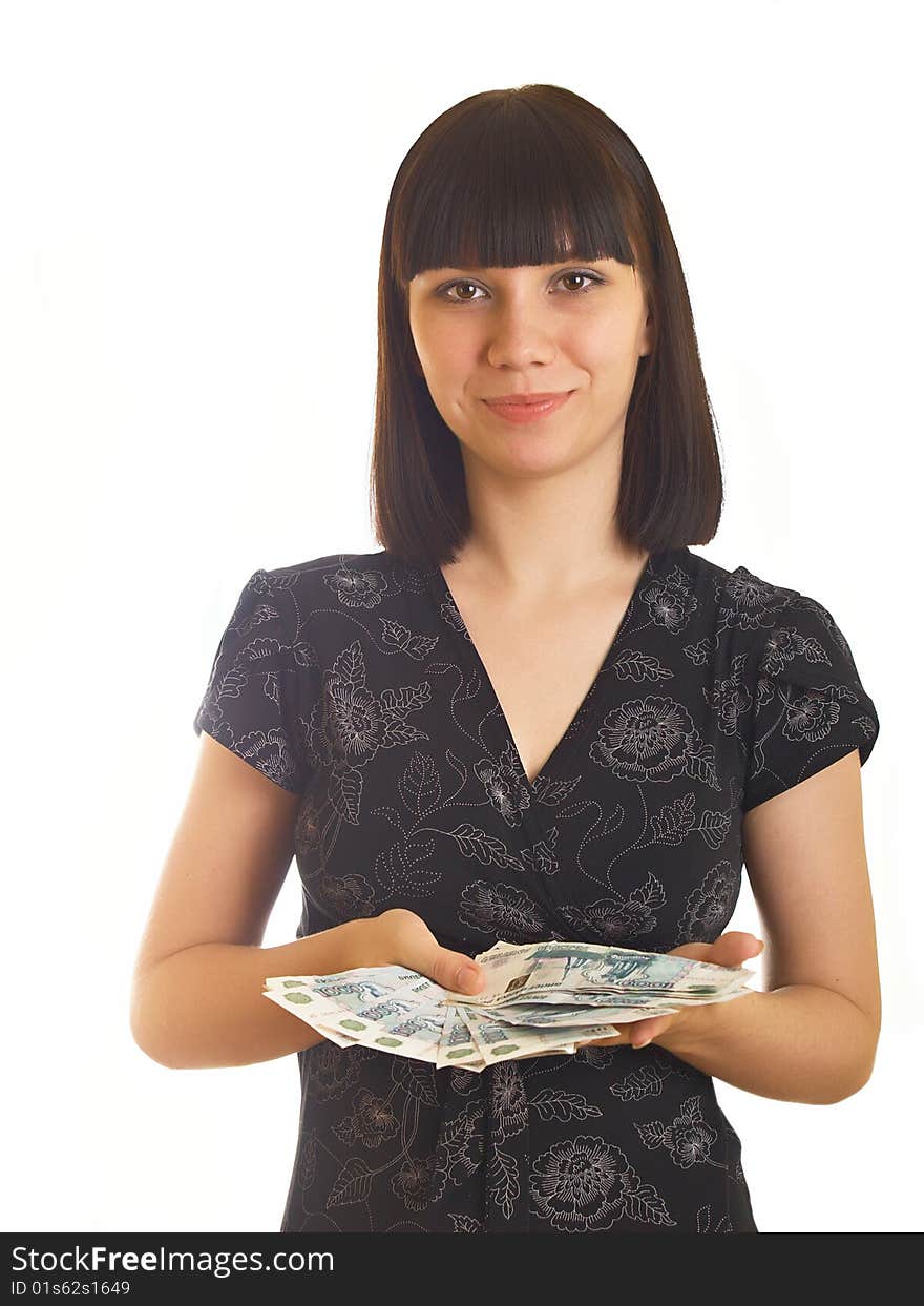 The young girl holds in hands Russian money for a white background. The young girl holds in hands Russian money for a white background