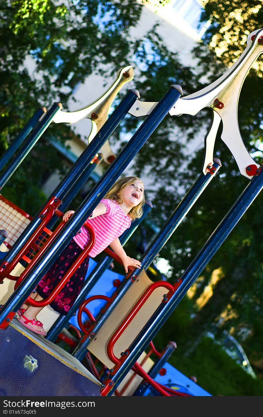 4 years old girl on playground