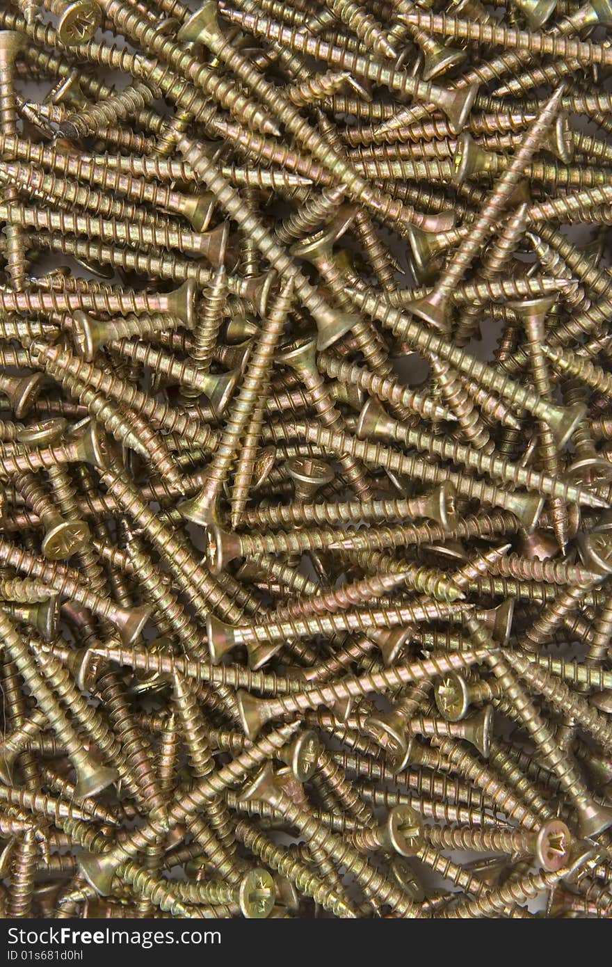 Background from staggered steel screws.