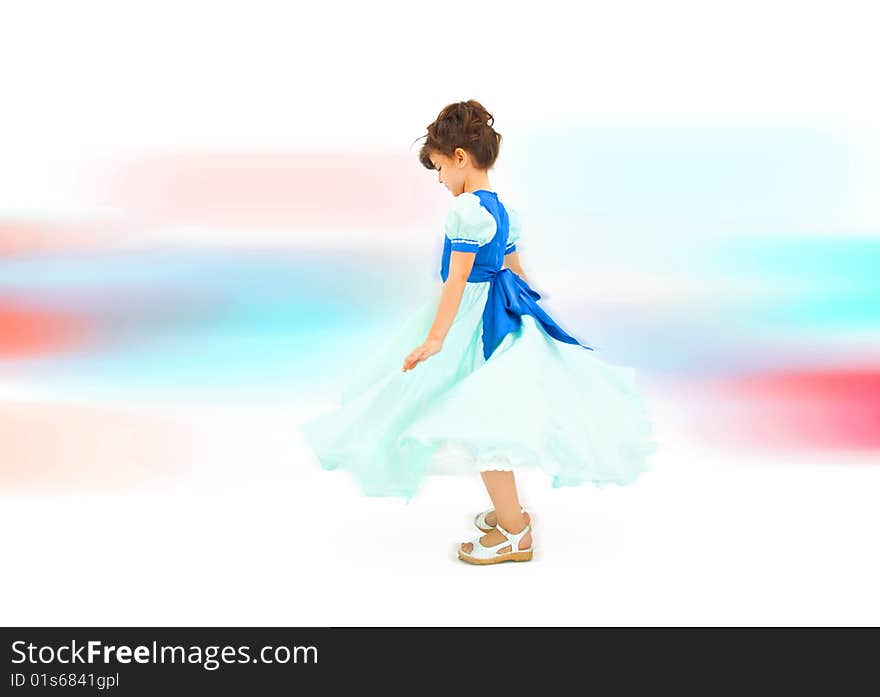 Cute little girl in blue dress dancing. Cute little girl in blue dress dancing