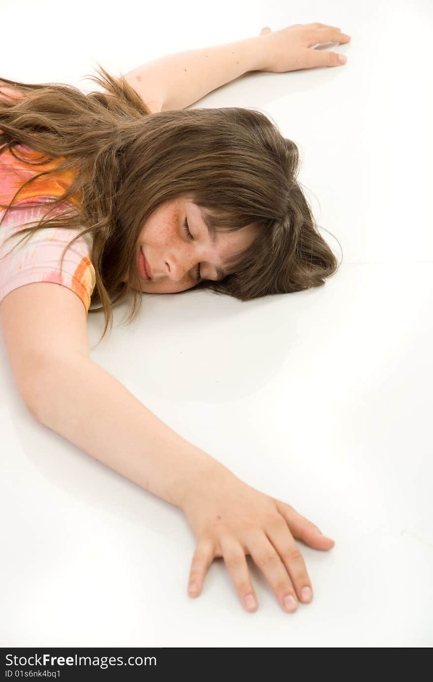 The sleeping girl on white background