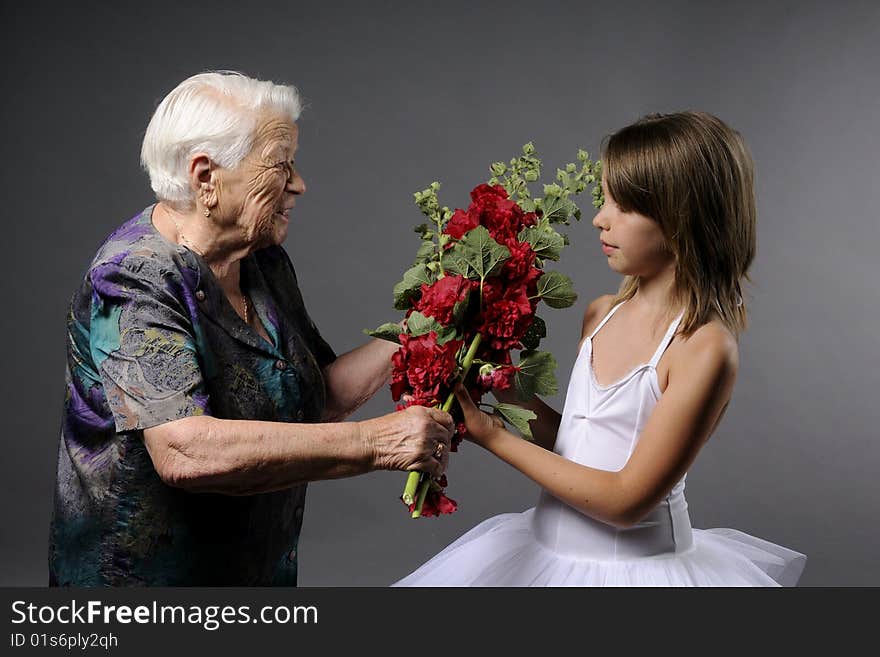 Young Ballerina Receiving Flowers