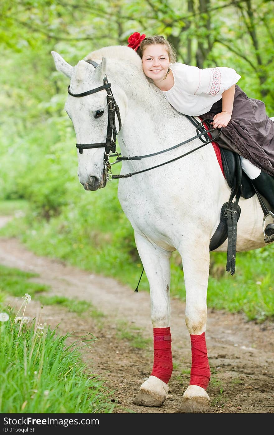 Beautiful Girl Riding White Horse