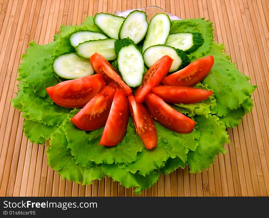 Fresh lettuce, tomatoes and cucumbers