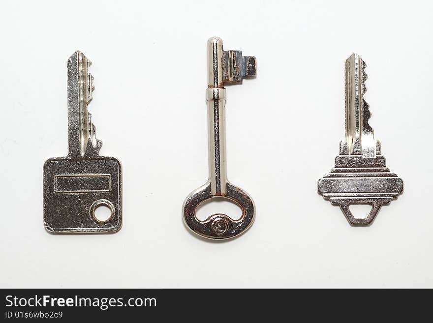 A bunch of keys isolated on white background.