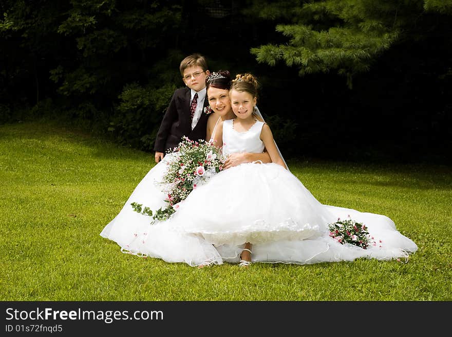 White Bride at her wedding posing with veil