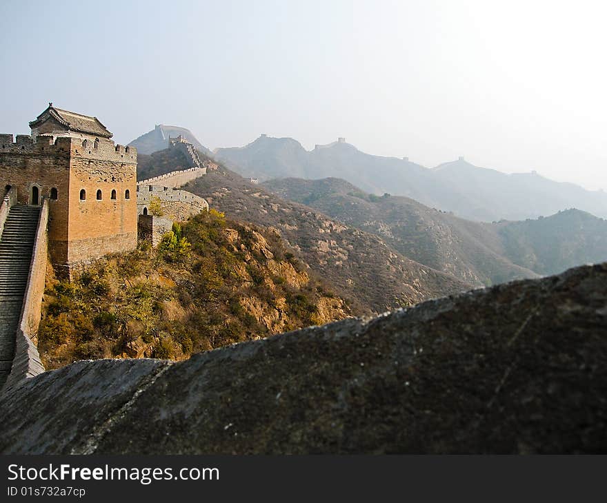 View of the Great Wall of China as it sprawls across the hills in Simatai near Beijing (restored section)