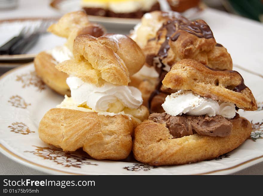 Hungarian creamy doughnuts on a plate. Hungarian creamy doughnuts on a plate