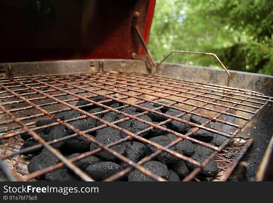 Rusty Grill with Black Coals