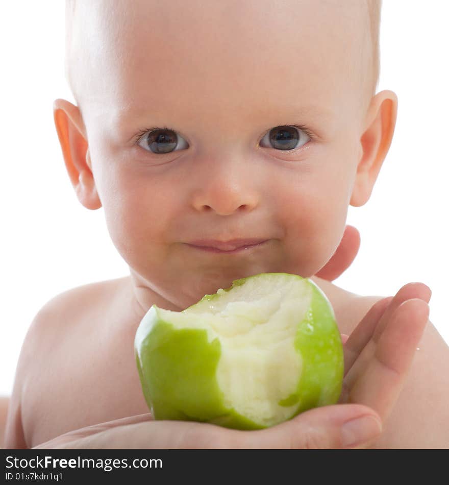 Mother give green apple to her son