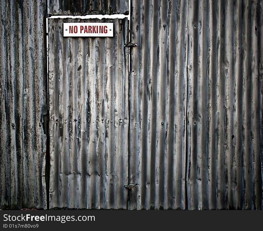 Taken in Dublin Ireland of a metal wall and door with nice texture. Taken in Dublin Ireland of a metal wall and door with nice texture