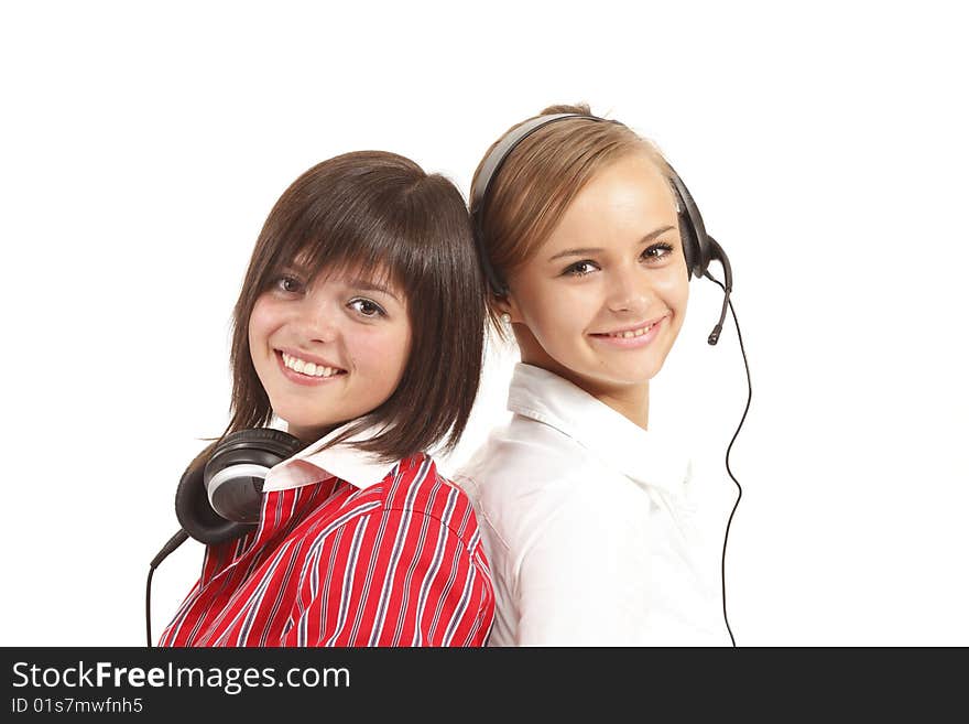 Two young beautiful women smile. It is isolated on a white background. Two young beautiful women smile. It is isolated on a white background.