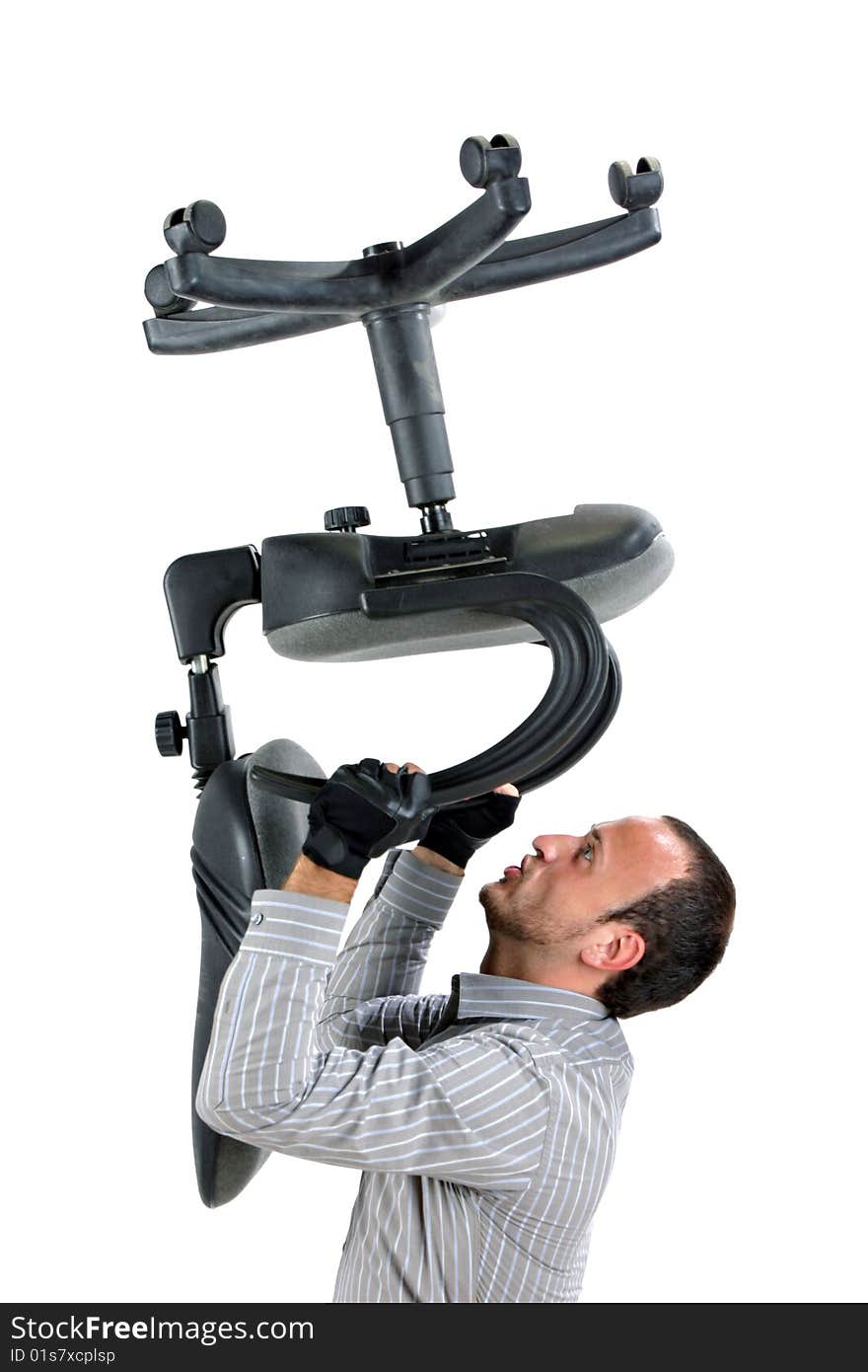 Angry bussinesman workingout with chair. Angry bussinesman workingout with chair