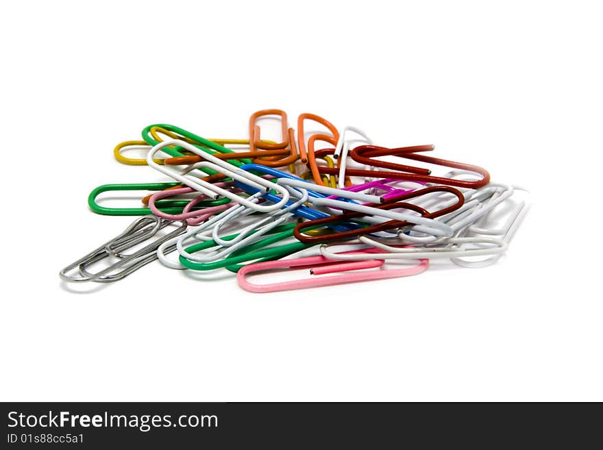 Multi-coloured paper clips isolated on a white background