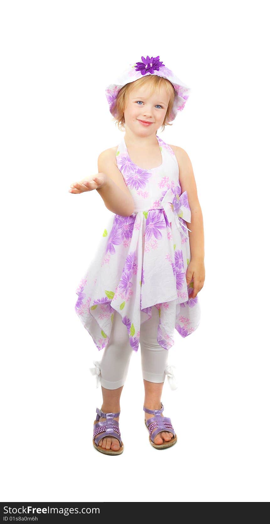 Caucasian cute little girl wearing a purple summer dress and heat stating and pointing up, isolated on white background. Caucasian cute little girl wearing a purple summer dress and heat stating and pointing up, isolated on white background.