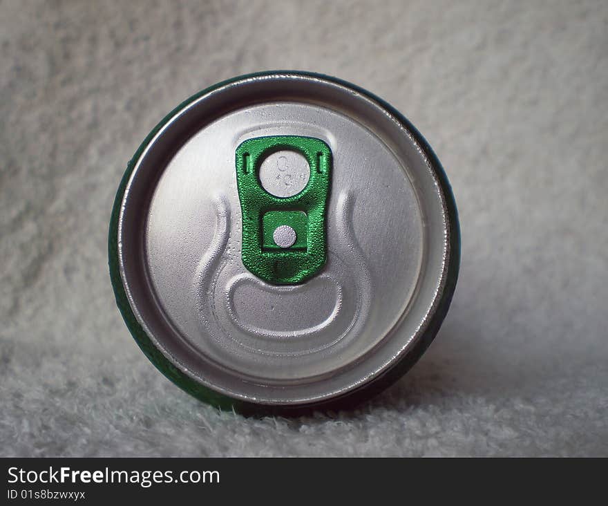 Close up view of the top of a fresh can on a white background