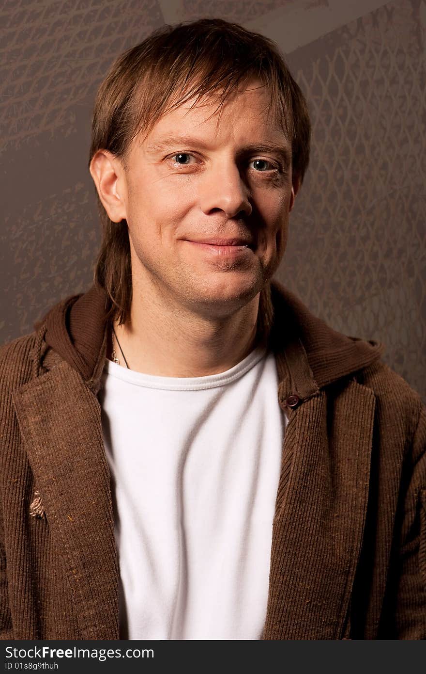 Man in jacket smiling isolated