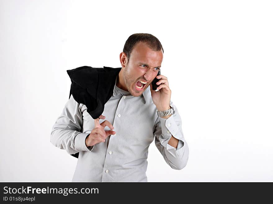 Businessman in black yelling at phone