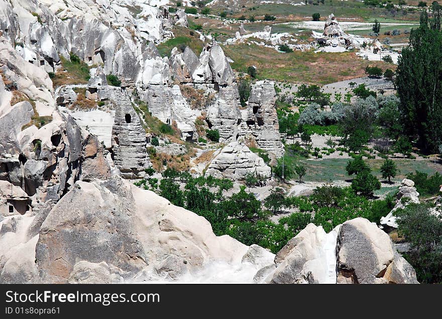 Goreme is a town in the Cappadocia region of Turkey. The town is centered in the middle of a internationally popular region that is best known for its natural rock formations, often called fairy chimneys. Goreme is a town in the Cappadocia region of Turkey. The town is centered in the middle of a internationally popular region that is best known for its natural rock formations, often called fairy chimneys.