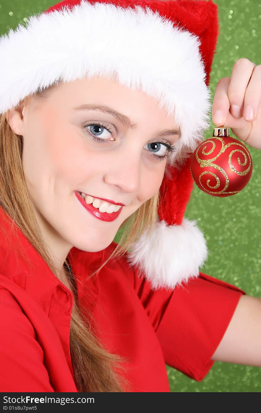 Teenager with red lips wearing a christmas hat. Teenager with red lips wearing a christmas hat