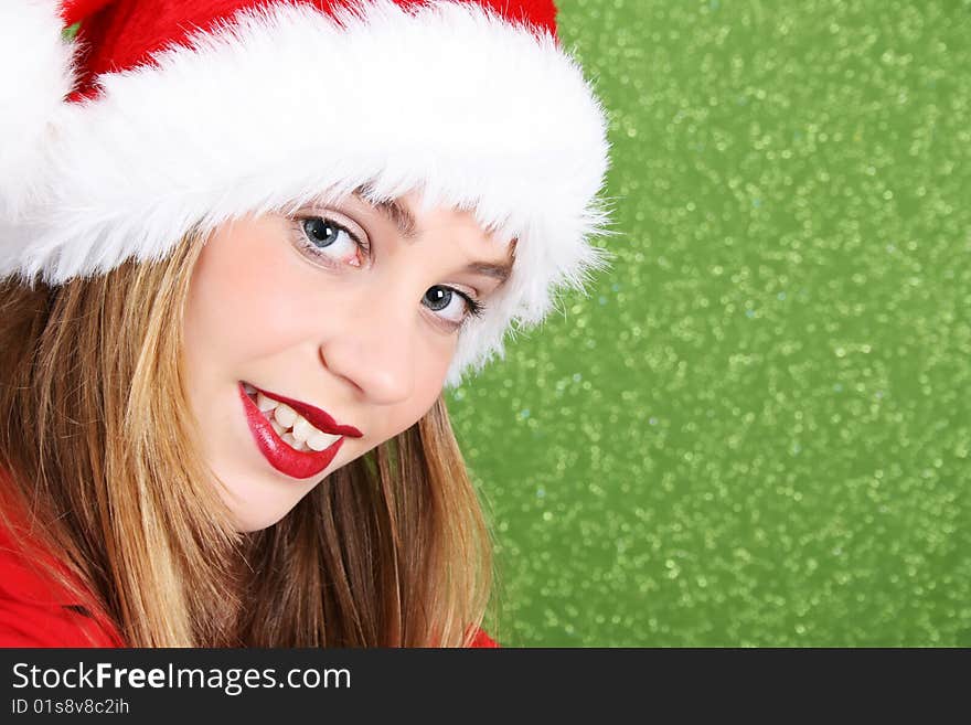 Teenager with red lips wearing a christmas hat. Teenager with red lips wearing a christmas hat