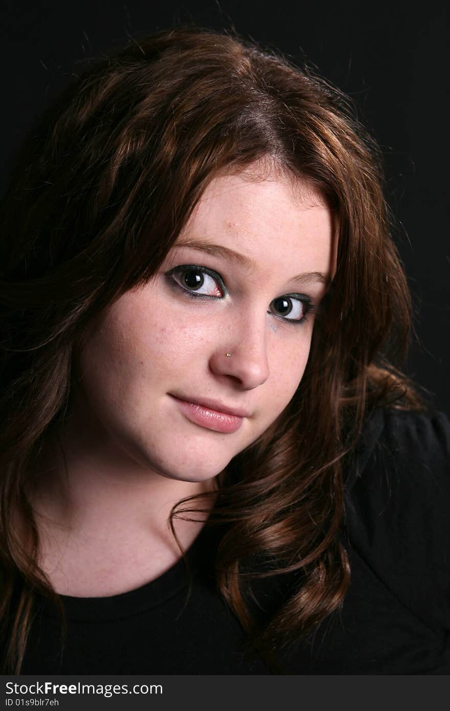 Portrait of pretty teenage girl with long hair